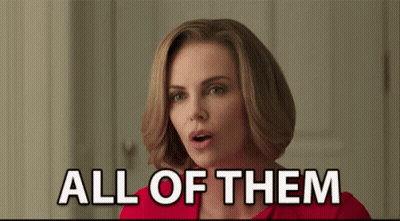 A Woman Is Saying " All Of Them " In A Red Shirt GIF