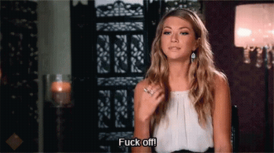 A Woman Is Saying " Fuck Off " While Sitting In A Chair GIF