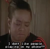 A Woman Is Saying I Dont Like People Playing On My Phone . GIF