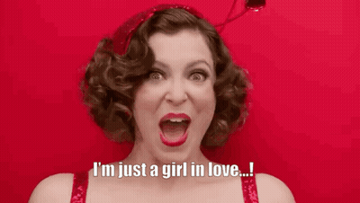 A Woman Is Saying I 'M Just A Girl In Love GIF
