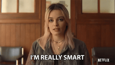 A Woman Is Saying I 'M Really Smart In Front Of A Netflix Logo . GIF