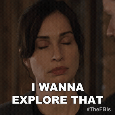 A Woman Is Saying " I Wanna Explore That " GIF
