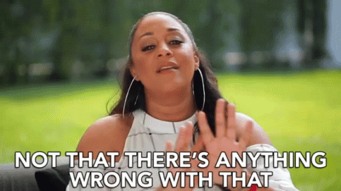A Woman Is Saying `` Not That There 'S Anything Wrong With That '' While Sitting On A Couch . GIF
