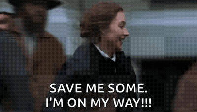 A Woman Is Saying `` Save Me Some , I 'M On My Way '' While Walking In A Crowd . GIF