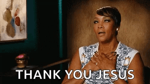 A Woman Is Saying Thank You Jesus With Her Hands On Her Chest . GIF