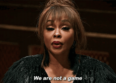 A Woman Is Saying We Are Not A Game In A Dark Room . GIF