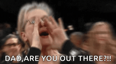 A Woman Is Screaming In A Crowd While Holding Her Hands To Her Face And Saying `` Dad , Are You Out There ? '' GIF