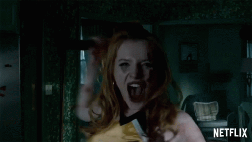 A Woman Is Screaming In A Room With A Netflix Logo On The Bottom GIF