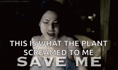 A Woman Is Screaming That The Plant Screamed To Her To Save Her . GIF