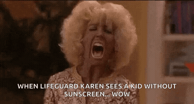 A Woman Is Screaming With Her Mouth Open While Wearing A Sunscreen . GIF