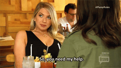 A Woman Is Sitting At A Table Talking To Another Woman And Saying So You Need My Help . GIF