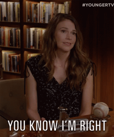 A Woman Is Sitting At A Table With A Baseball And Says " You Know I 'M Right " GIF