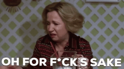 A Woman Is Sitting At A Table With A Glass Of Water And A Straw And Says Oh For Fuck 'S Sake . GIF