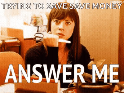 A Woman Is Sitting At A Table With A Knife In Her Hand And The Words " Trying To Save Save Money Answer Me " Behind Her GIF