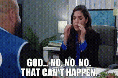 A Woman Is Sitting At A Table With A Man And Eating Food While Talking To Him . GIF