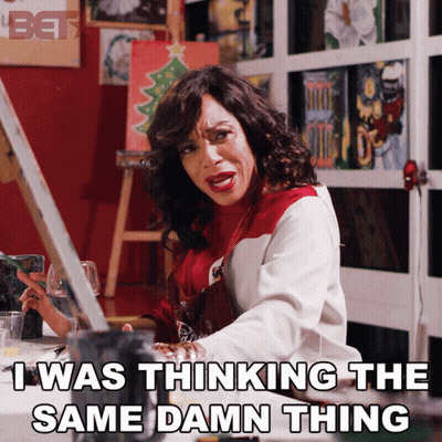 A Woman Is Sitting At A Table With A Painting And Says I Was Thinking The Same Damn Thing GIF