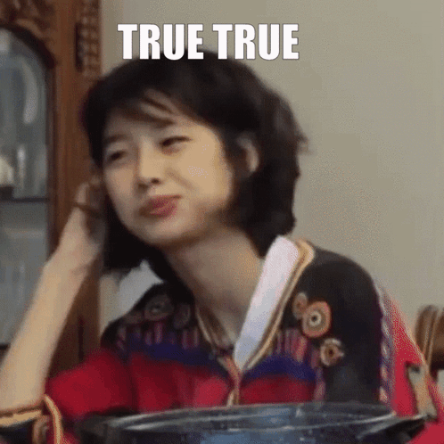 A Woman Is Sitting At A Table With A Pot In Front Of Her And The Words `` True True '' Written On The Screen . GIF