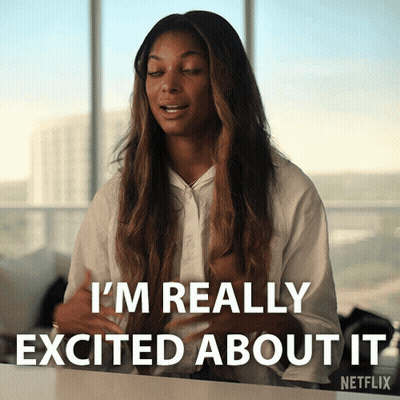 A Woman Is Sitting At A Table With Her Eyes Closed And The Words I 'M Really Excited About It Behind Her GIF