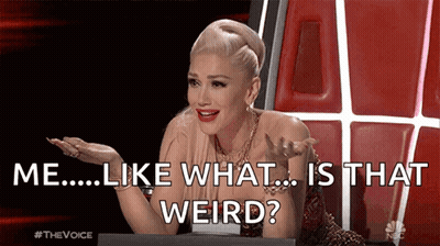 A Woman Is Sitting At A Table With The Words " Me ... Like What ... Is That Weird " Written On The Screen . GIF