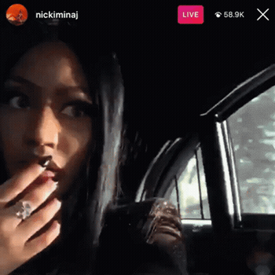 A Woman Is Sitting In A Car With A Live Button On The Bottom GIF