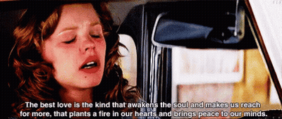 A Woman Is Sitting In A Car With Her Eyes Closed And A Quote About Love GIF