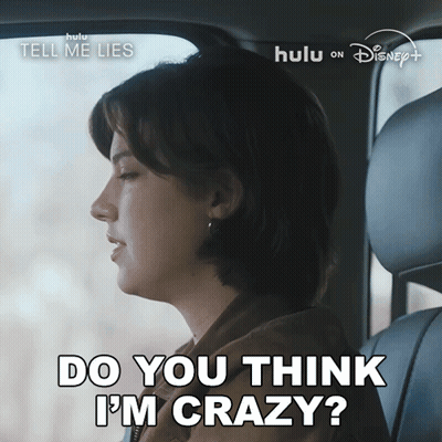 A Woman Is Sitting In A Car With The Words Do You Think I 'M Crazy GIF