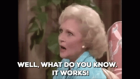 A Woman Is Sitting In A Chair And Talking To Someone . GIF