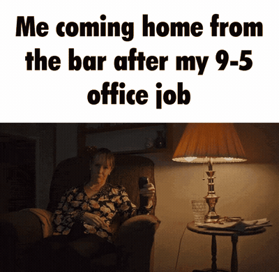 A Woman Is Sitting In A Chair Holding A Cell Phone With The Words Me Coming Home From The Bar After My 9 -5 Office Job GIF