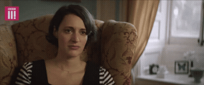 A Woman Is Sitting In A Chair With A Bbc Logo On The Bottom Right GIF