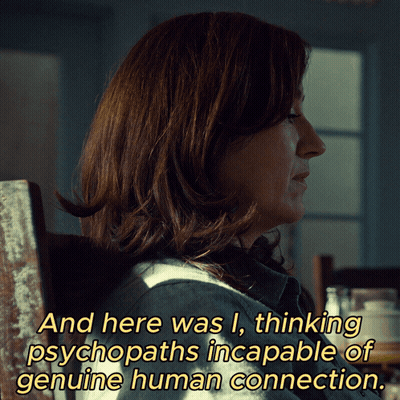A Woman Is Sitting In A Chair With A Caption That Says And Here Was I GIF