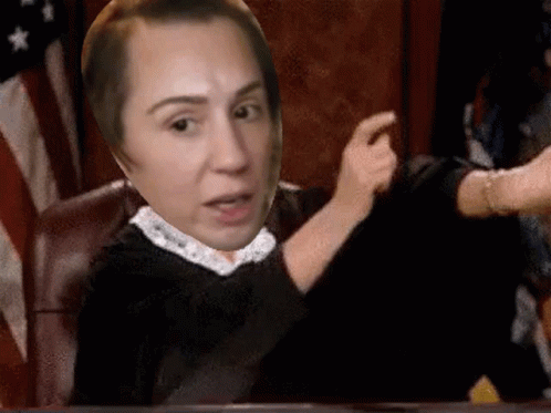 Woman Sitting With Judge's Face On Her Face GIF
