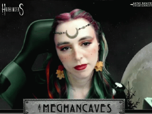 A Woman Is Sitting In A Chair With A Sign That Says Meghancaves On It GIF