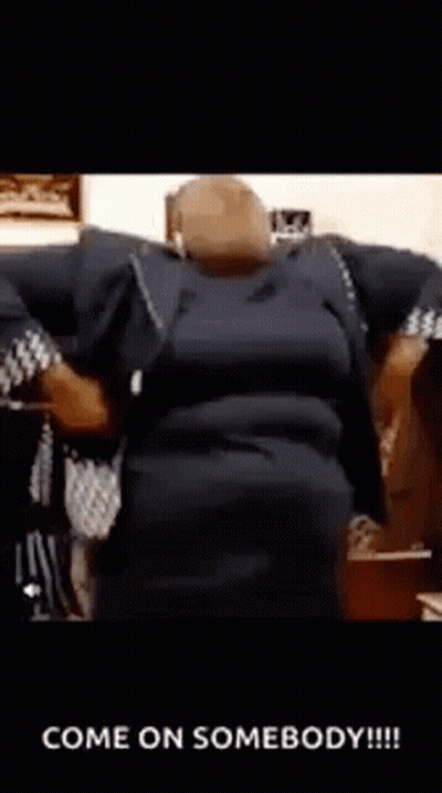 A Woman Is Sitting In A Chair With Her Arms Outstretched And The Words `` Come On Somebody '' Written On The Bottom . GIF