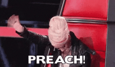 A Woman Is Sitting In A Chair With Her Fist In The Air And The Words Preach Written On The Screen Behind Her . GIF