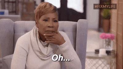 A Woman Is Sitting In A Chair With Her Hand On Her Chin And Says `` Oh '' . GIF