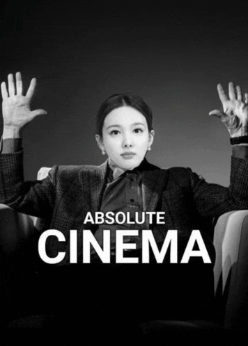 A Woman Is Sitting In A Chair With Her Hands In The Air And The Words Absolute Cinema Behind Her GIF