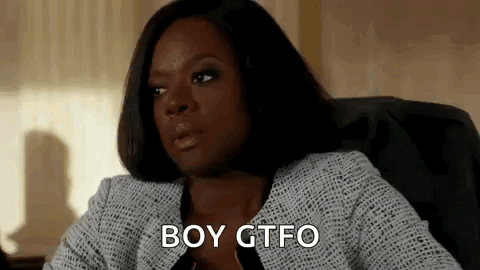 A Woman Is Sitting In A Chair With The Words `` Boy Gtfo '' Written On Her Face . GIF