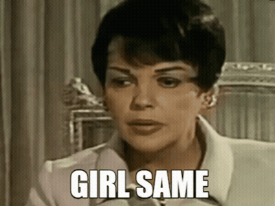 A Woman Is Sitting In A Chair With The Words `` Girl Same '' On Her Face . GIF