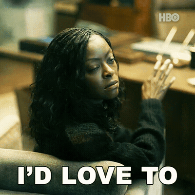 A Woman Is Sitting In A Chair With The Words I 'D Love To Behind Her GIF