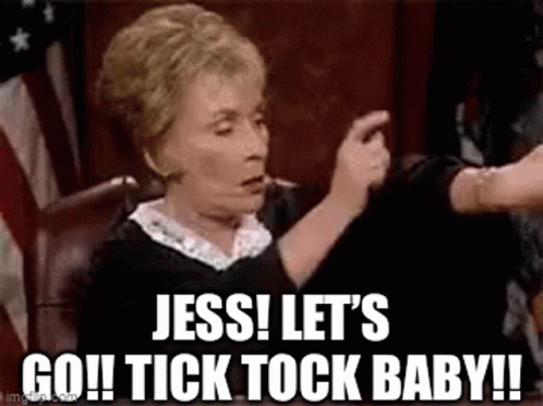 Woman Sitting In Court Making Funny Face And Holding Hand Of Another Woman GIF
