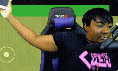a woman is sitting in a purple chair with the word tr3b on it