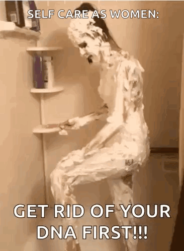 A Woman Is Sitting In A Shower Covered In Shaving Cream And Foam . GIF