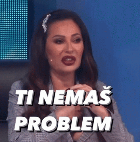 A Woman Is Sitting In Front Of A Blue Screen With The Words `` Ti Nemas Problem '' Written On It . GIF