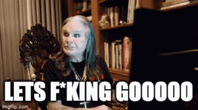 A Woman Is Sitting In Front Of A Computer With The Words Let 'S F * King Gooooo Written Below Her GIF