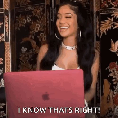 A Woman Is Sitting In Front Of A Laptop Computer And Smiling While Saying I Know That 'S Right . GIF