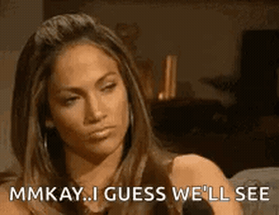 A Woman Is Sitting In Front Of A Microphone And Saying `` Mmkay ... I Guess We 'Ll See '' GIF