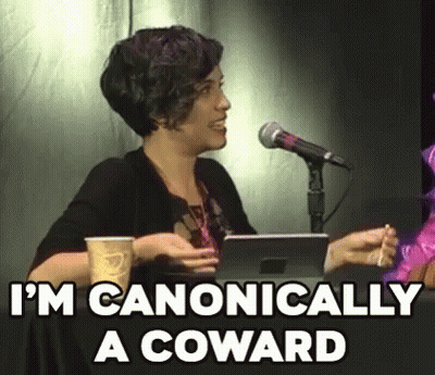 A Woman Is Sitting In Front Of A Microphone Holding A Cup Of Coffee And A Tablet . GIF