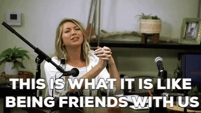 A Woman Is Sitting In Front Of A Microphone With The Words " This Is What It Is Like Being Friends With Us " GIF