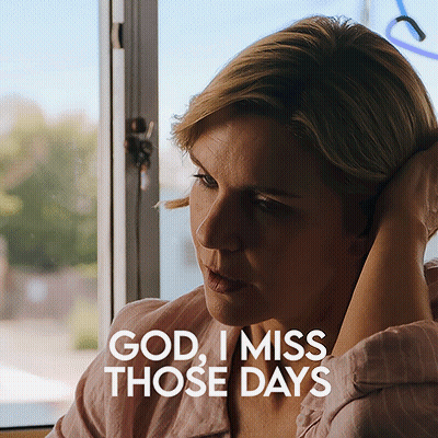 A Woman Is Sitting In Front Of A Window With The Words God I Miss Those Days Written Above Her GIF