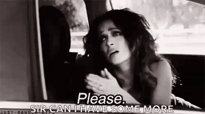 A Woman Is Sitting In The Back Seat Of A Car And Asking For Something . GIF